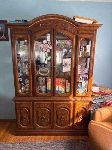 Traditional Wooden China Cabinet with Carved Details