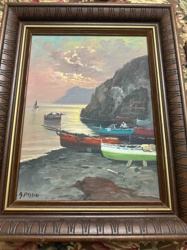 Seaside Village with Fishing Boats at Sunset