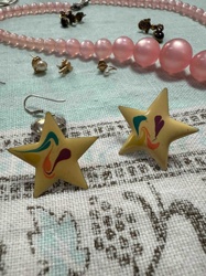 Star-Shaped Dangle Earrings with Enamel Swirls