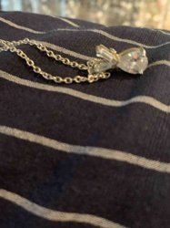 Silver-Toned Necklace with Pear and Baguette Stone Bow Pendant