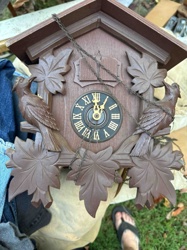 Traditional Cuckoo Clock with Bird and Leaf Carvings