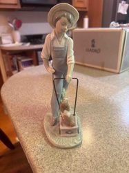Lladró 'Boy with Lawnmower and Bunny' Porcelain Figurine