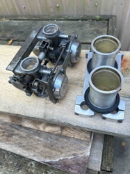Motorcycle Carburetors with Velocity Stacks and Air Filters