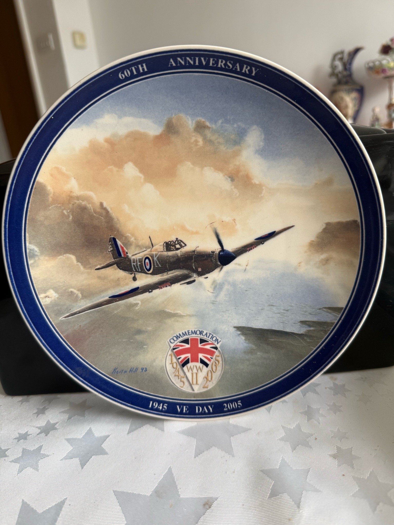 Submitted photo of Commemorative porcelain plate signed 'Keith Hill 93'