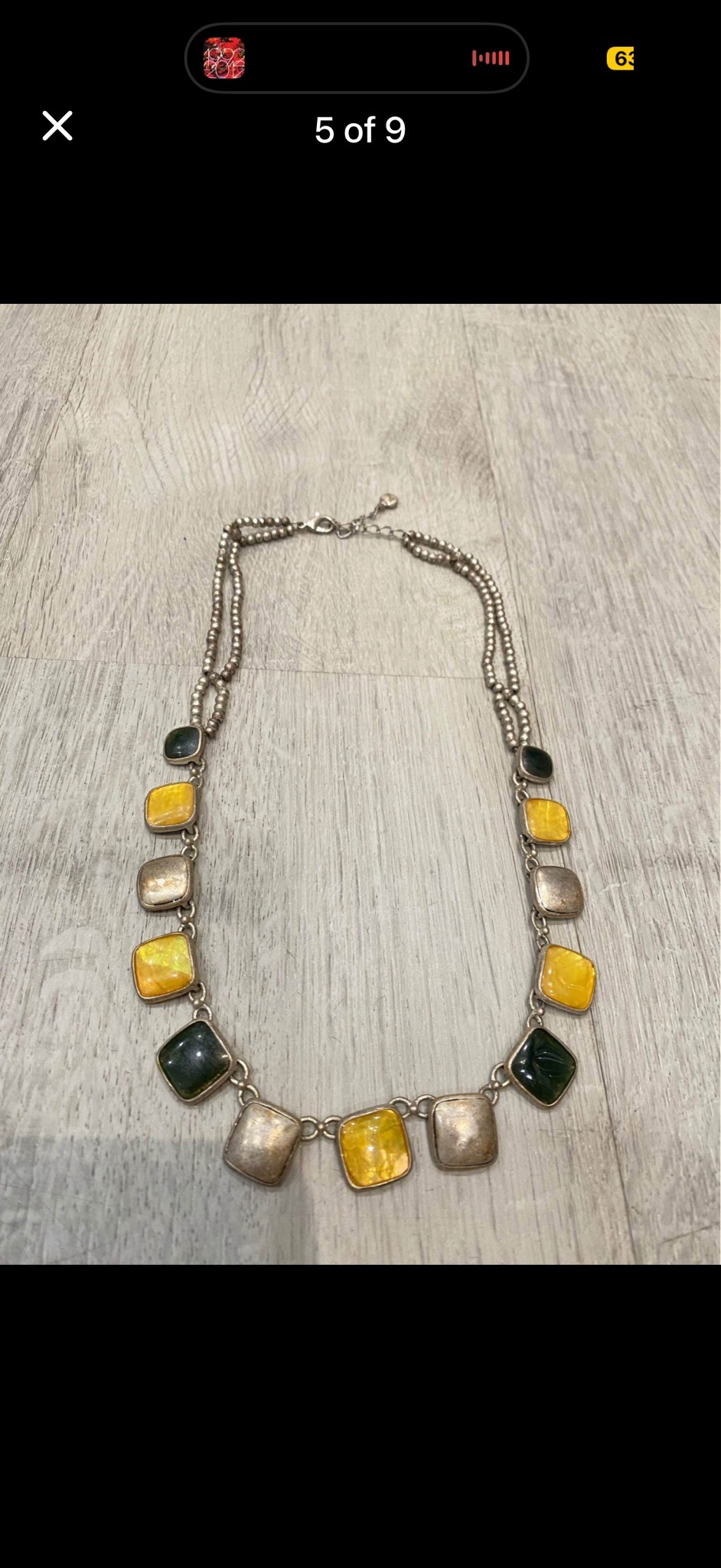 Submitted photo of Multi-strand statement necklace with square-cut yellow, green, and metallic-finish panels