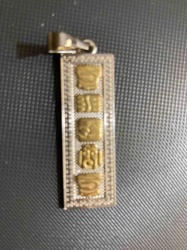 Two-Tone Rectangular Pendant with Embossed Symbols