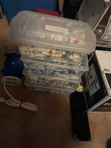 Assorted Tubes of Paint in Plastic Storage Containers