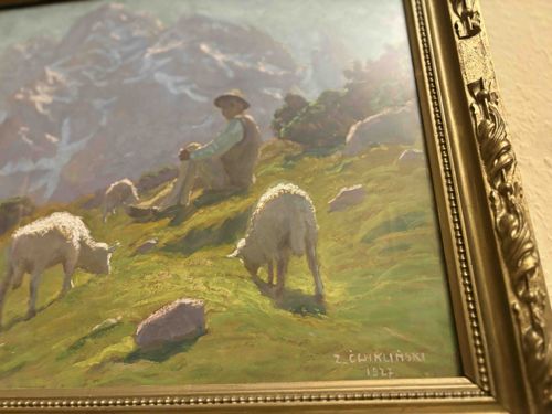Shepherd with Sheep in a Mountainous Landscape
