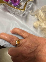 Gold Ring with Pear-Cut Orange Stone and Diamond Accents