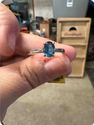 Oval-Cut Blue Gemstone Solitaire Ring