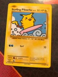Surfing Pikachu Pokémon Trading Card (2016 promotional card)