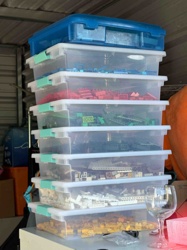 Collection of LEGO Bricks in Stackable Storage Bins