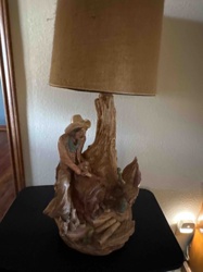 Western-themed Cowboy and Campfire Table Lamp