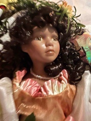 Porcelain or Bisque Doll with Flower Headdress and Pearl Necklace