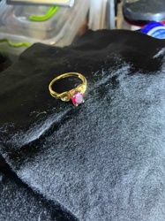 Gold-Toned Ring with Oval Red Gemstone and Accent Stones
