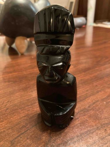 Seated Figure Carving in Blackstone