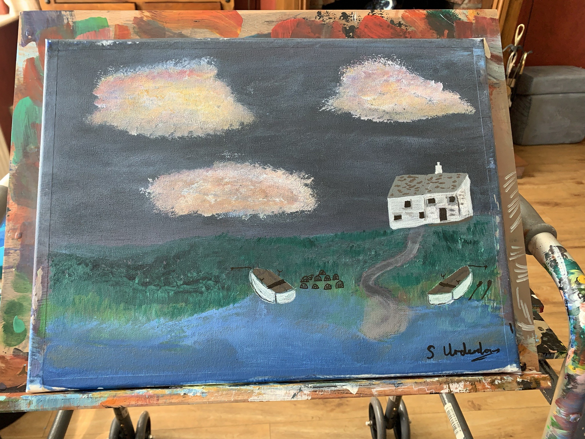 Submitted photo of Painting of a coastal cottage signed 'S. Underwood'