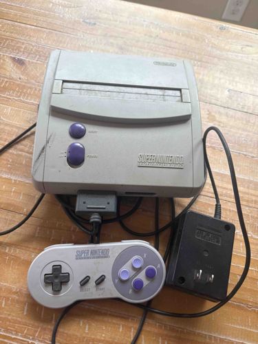 Super Nintendo Entertainment System (SNES) Model SNS-001 with Controller and AC Adapter