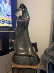 Bronze Sculpture of a Native American Woman with a Fan