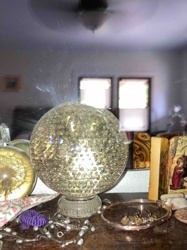 Clear Glass Sphere with Internal Bubbles on a Pedestal Base