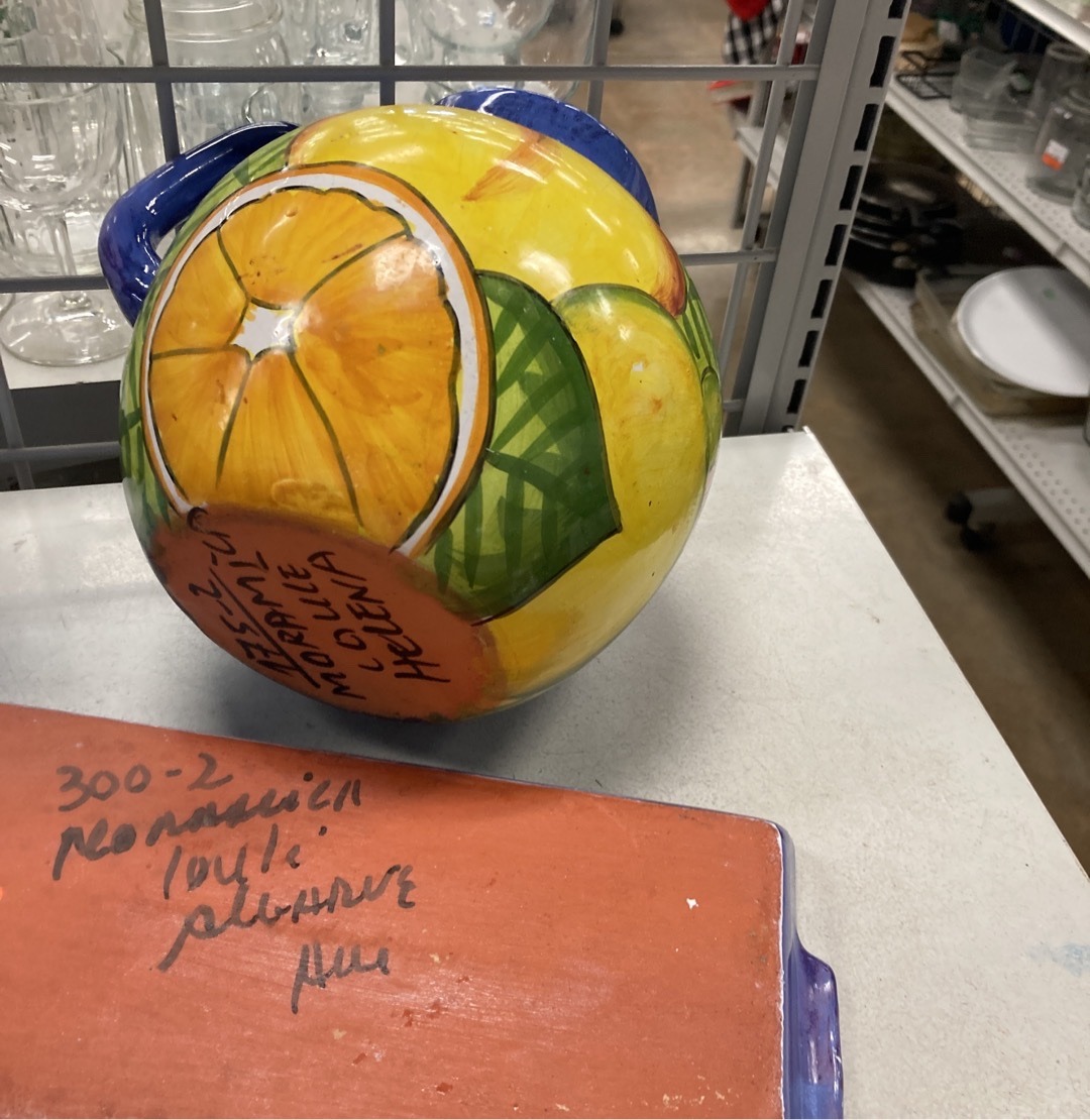 Submitted photo of Hand-painted ceramic pitcher and matching tray