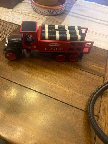 True Value Die-Cast Toy Truck with Barrels