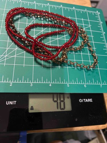 Multi-strand Red Beaded Necklace with Brass-Toned Chain Accents