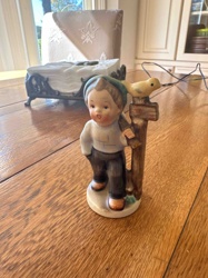 Goebel Hummel-style Boy with Bird Figurine