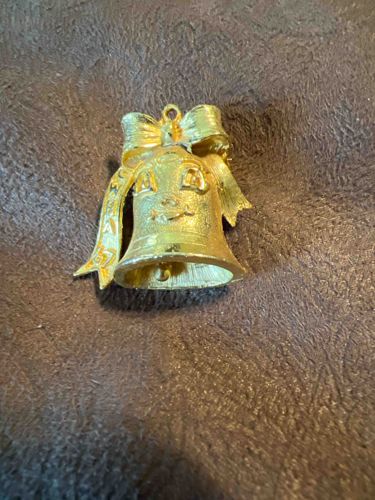 Gold-Toned Bell Pendant with Bow