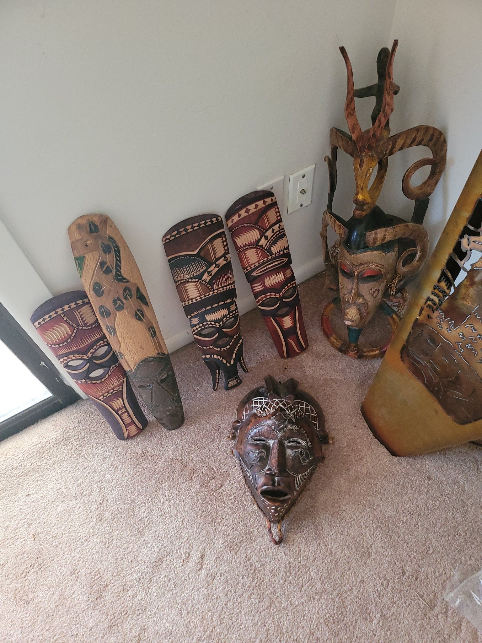 Submitted photo of Carved Wooden Tribal Masks Collection