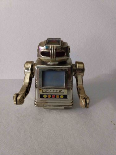 Vintage Silver-Toned Mechanical Toy Robot