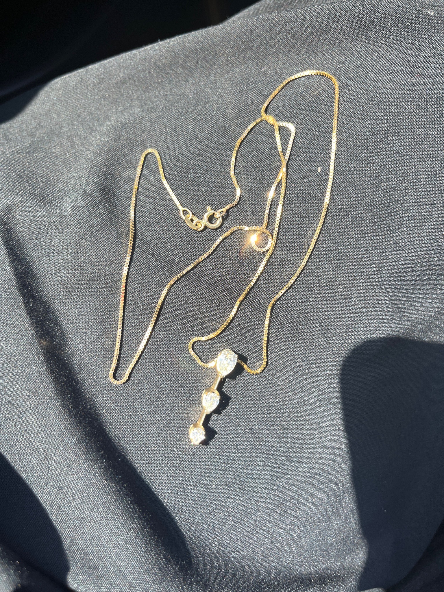 Submitted photo of Gold gemstone drop necklace