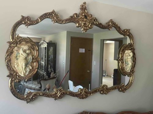 Ornate Rococo Revival Wall Mirror with Figural Reliefs