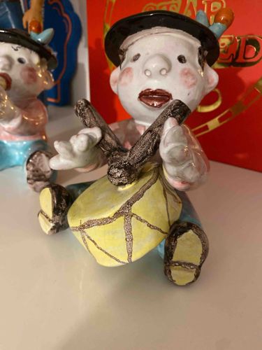 Seated Ceramic Musician Figurine (Drummer)