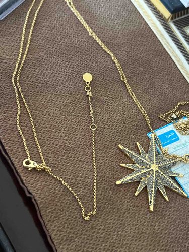 Gold-Toned Starburst Pendant Necklace