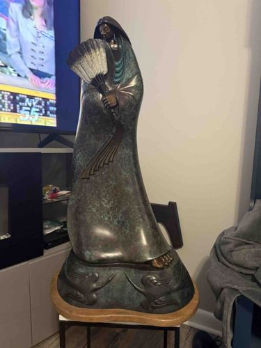 Bronze Statue of a Native American Woman with Fan