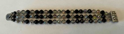 Multi-Strand Faceted Bead Bracelet with Iridescent and Black Beads