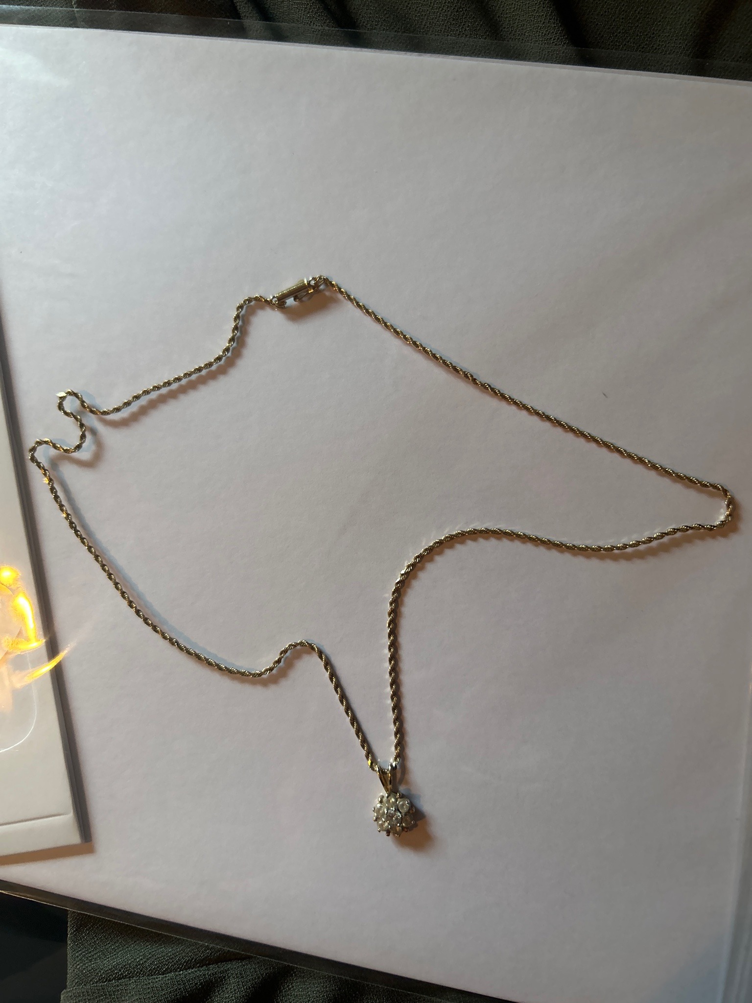 Submitted photo of Gold necklace with cluster pendant