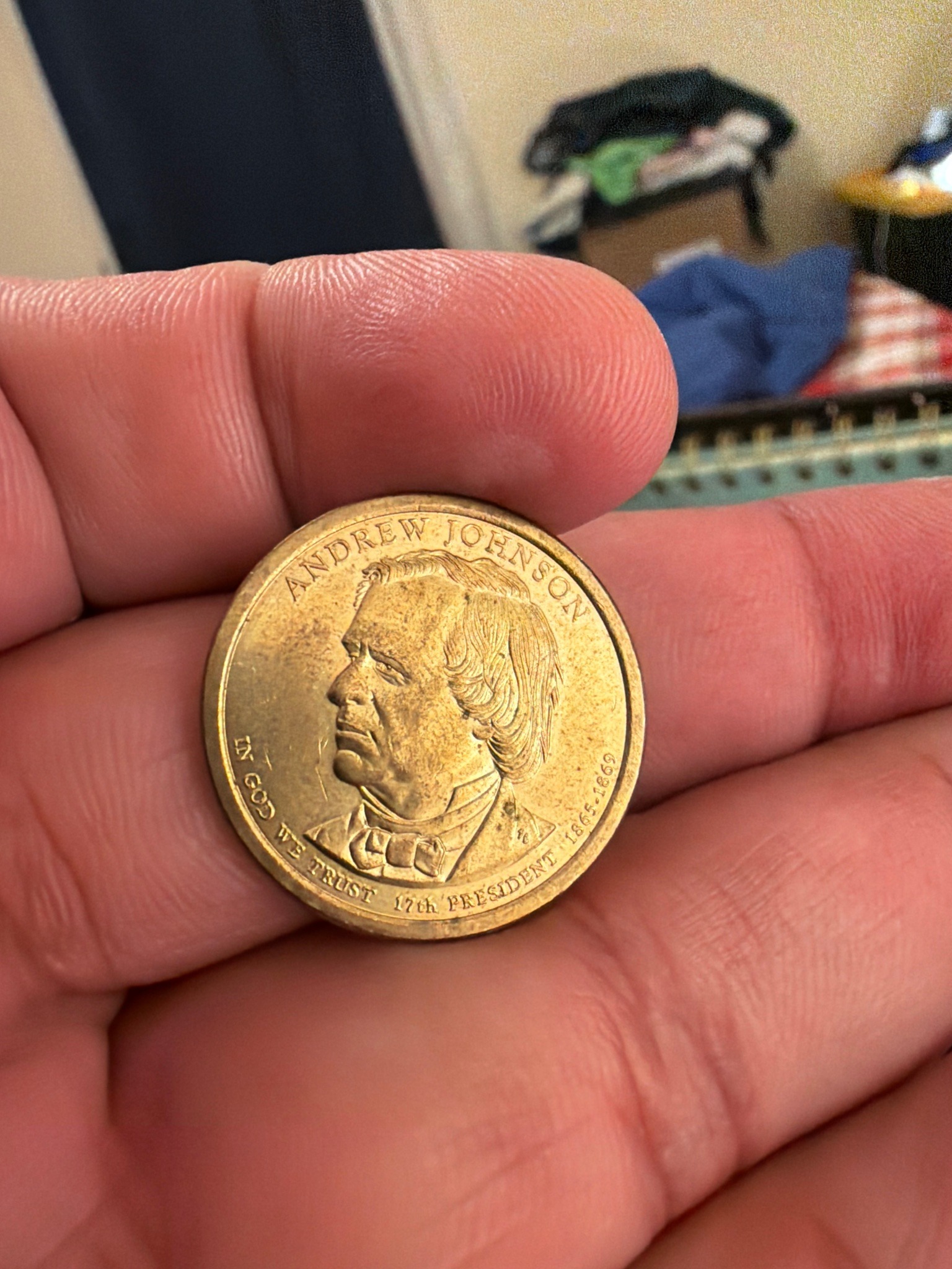 Submitted photo of Presidential dollar coin bearing a likeness of Andrew Johnson