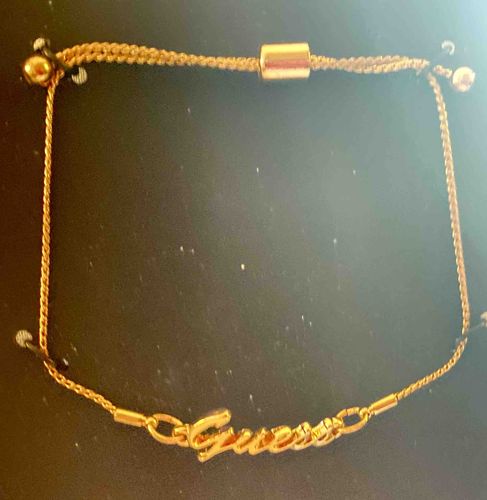 Guess Gold-Tone Logo Slider Bracelet