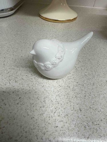 White Ceramic Bird Figurine with Lace-like Collar Detail