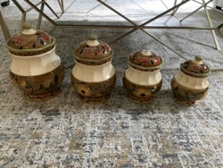 Set of Four Glazed Ceramic Floral Jars
