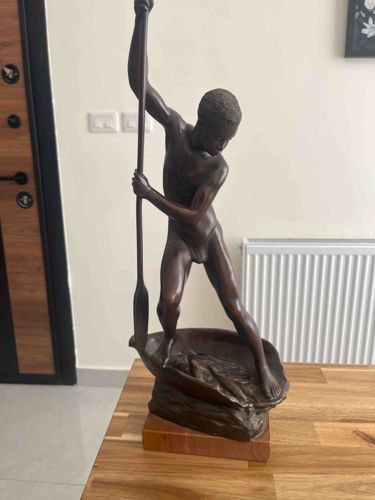 Bronze Sculpture of a Fisher Boy with Oar
