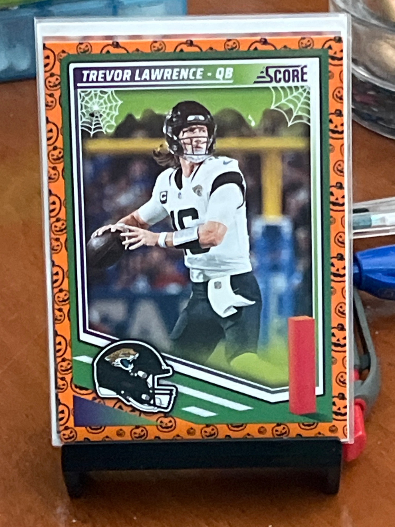 2023 Panini Score Trevor Lawrence Pumpkin Border Parallel Football Card