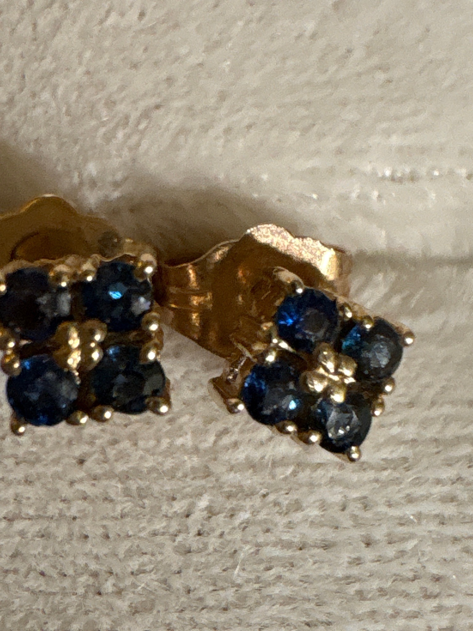 Submitted photo of Gold and blue gemstone stud earrings