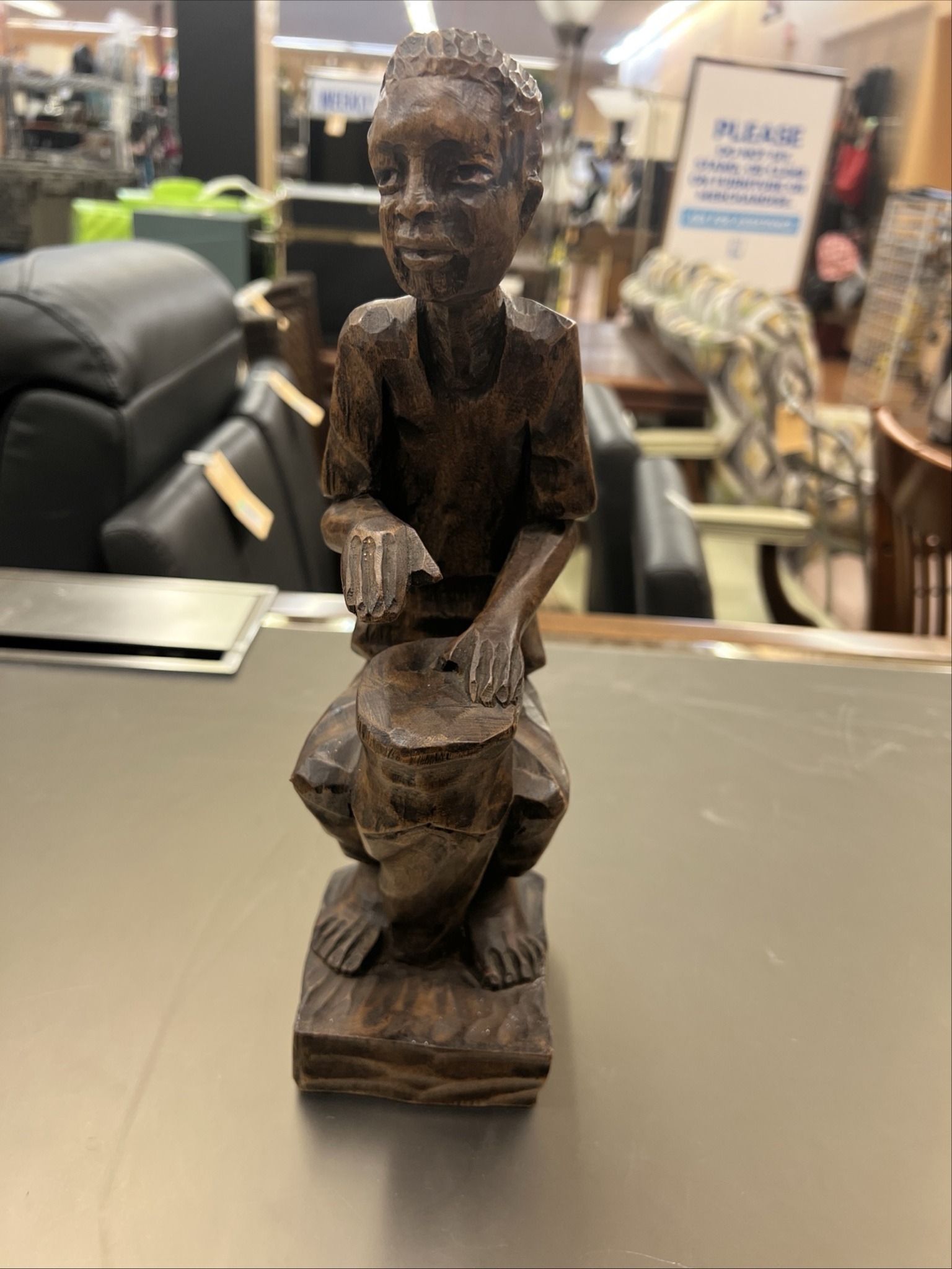 Submitted photo of Hand-carved wooden drummer sculpture