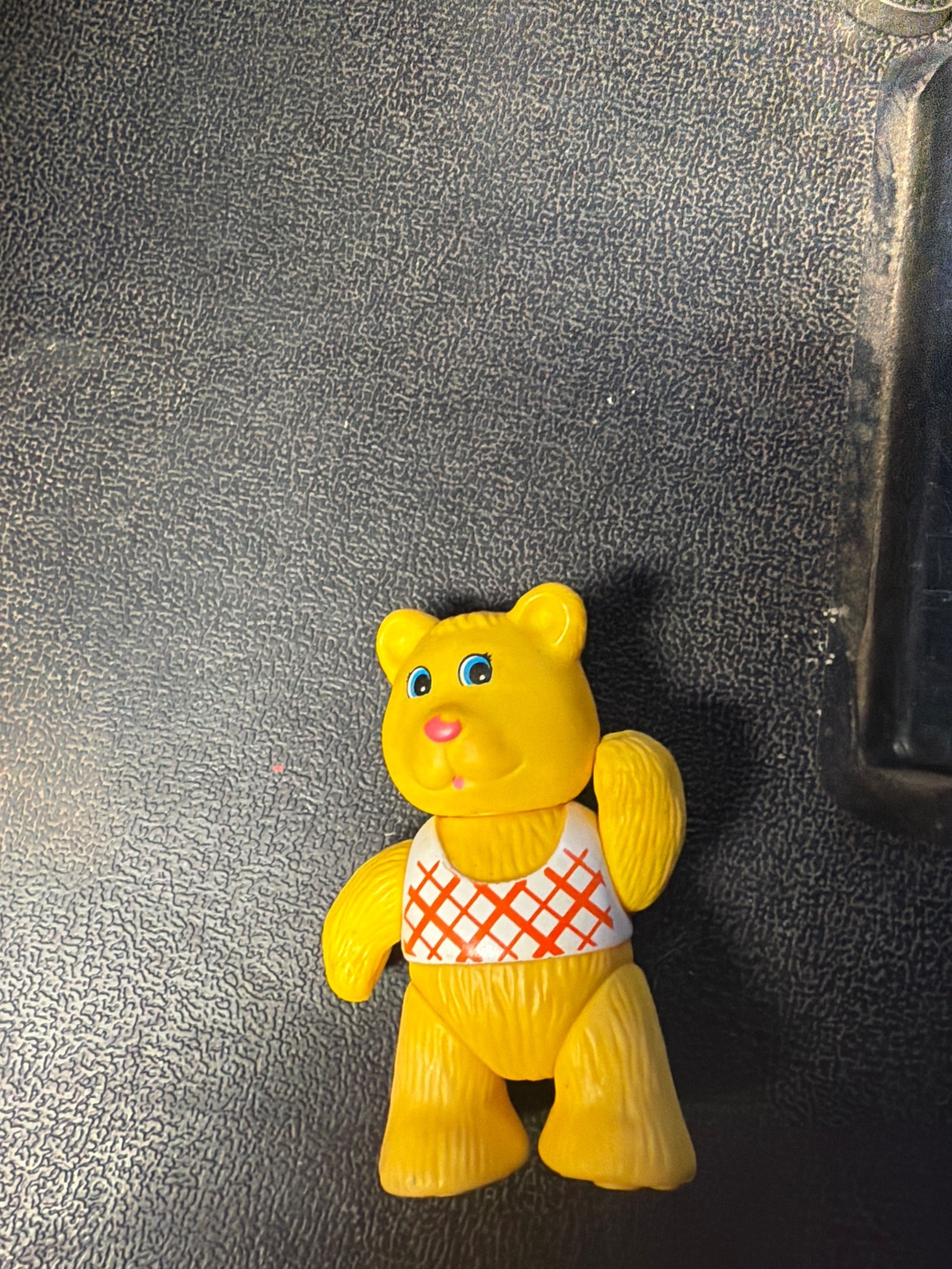 Submitted photo of Vintage yellow plastic toy bear figurine
