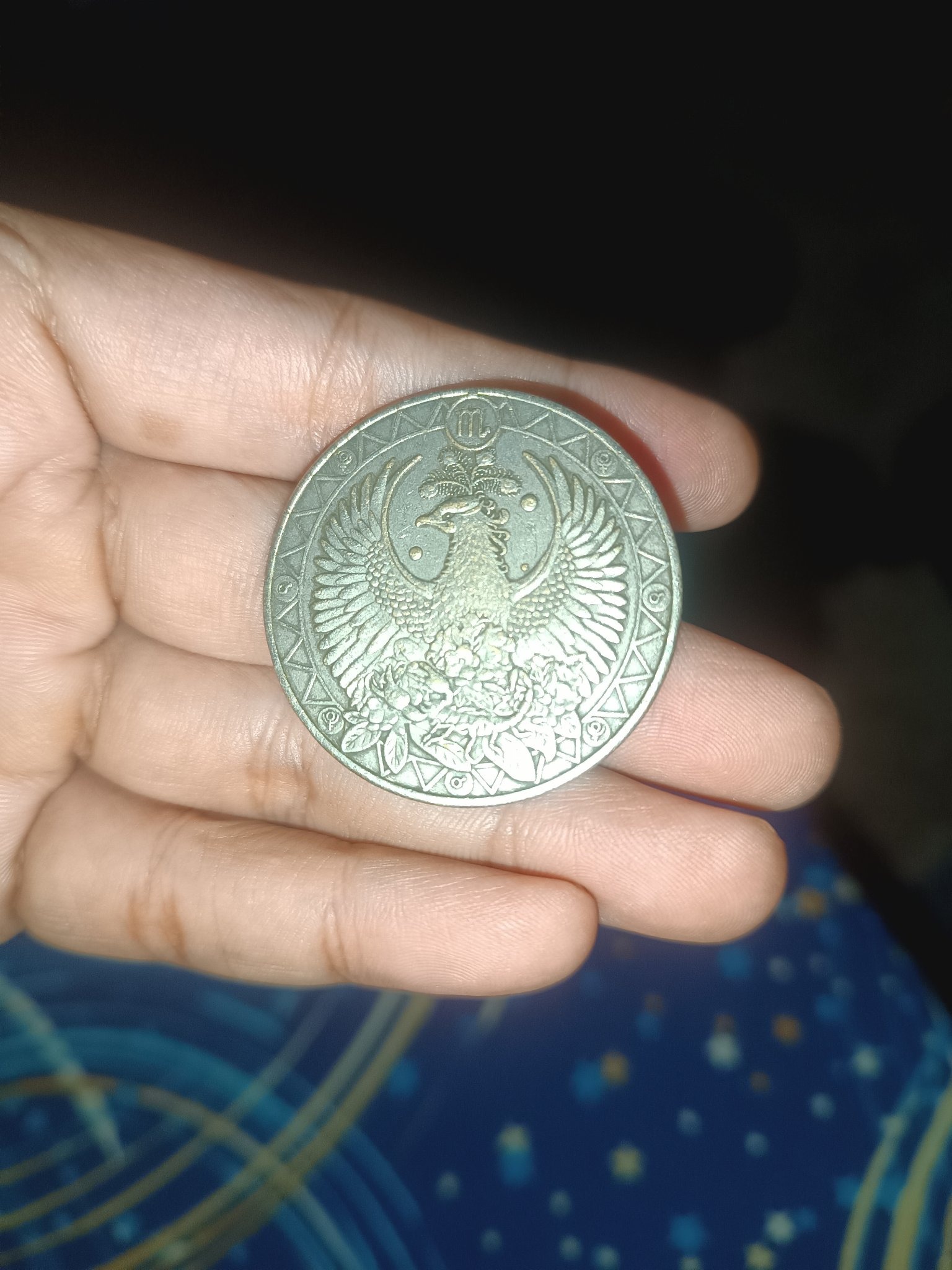 Submitted photo of Decorative metal token or coin