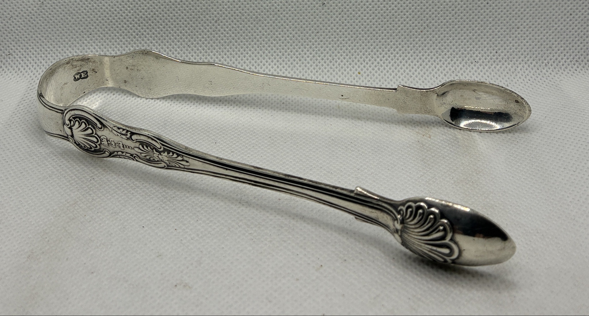 Submitted photo of Silver sugar tongs, attributed to William Eaton (not authenticated)