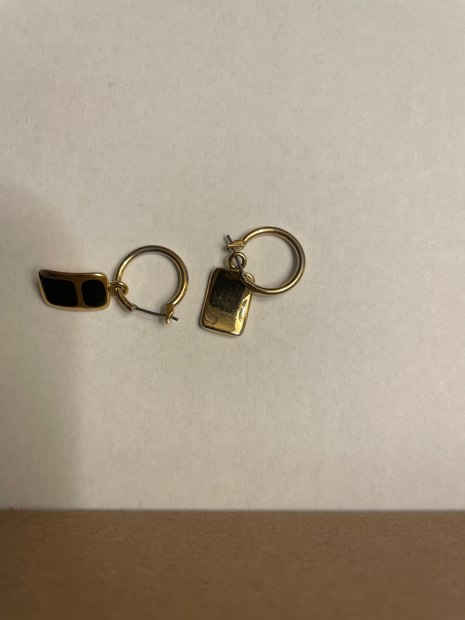 Submitted photo of Gold-tone hoop earrings with rectangular charms